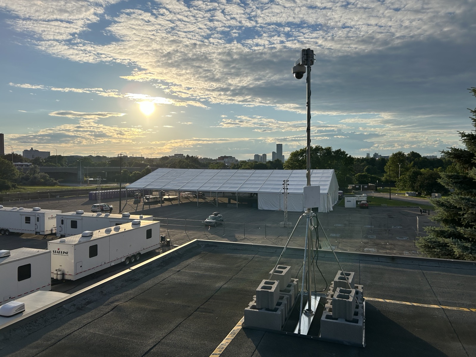 Temporary surveillance mast overlooking an event operations site